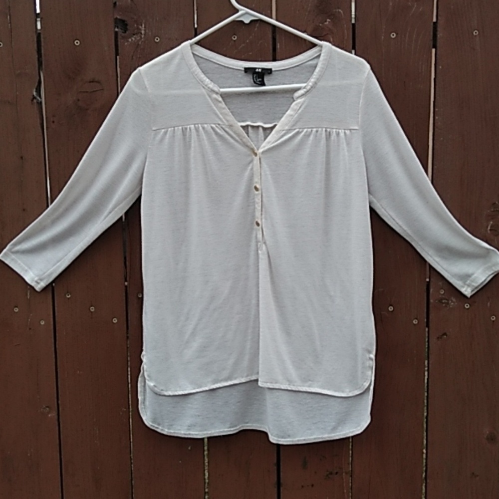 White shirt gold bottons
